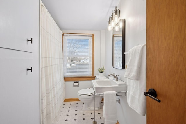 bathroom with sink and toilet