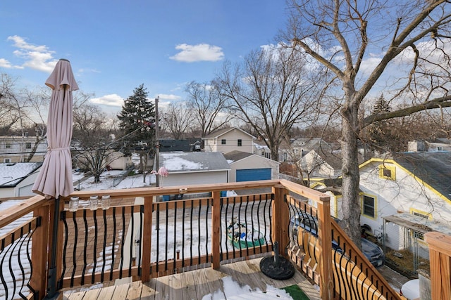 view of snow covered deck