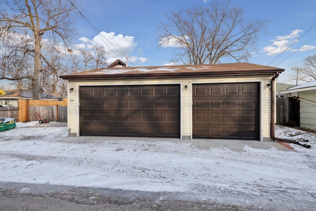 view of snow covered garage