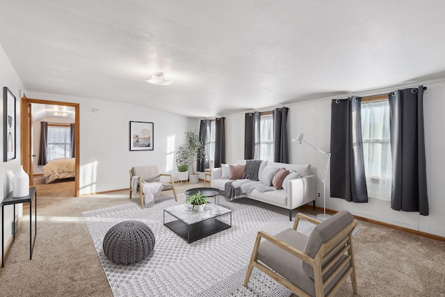 living room featuring light carpet