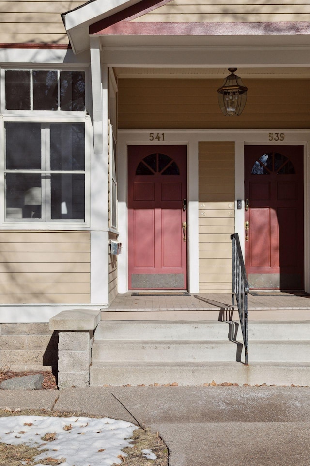 doorway to property featuring a porch