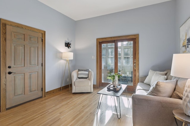 living room with light hardwood / wood-style flooring