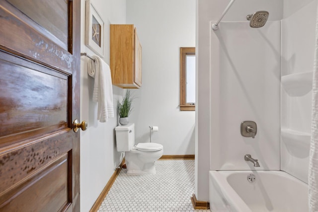 bathroom featuring tile patterned floors,  shower combination, and toilet