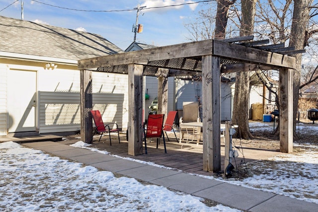 view of snow covered patio