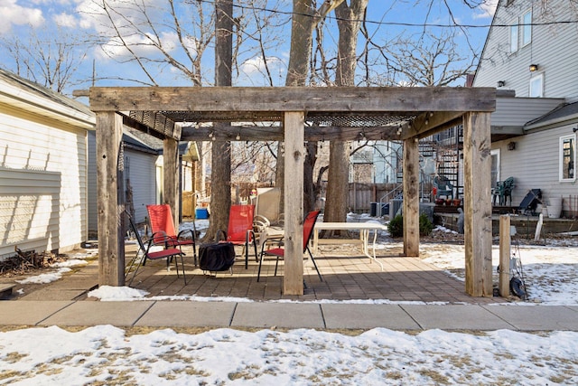 view of snow covered patio