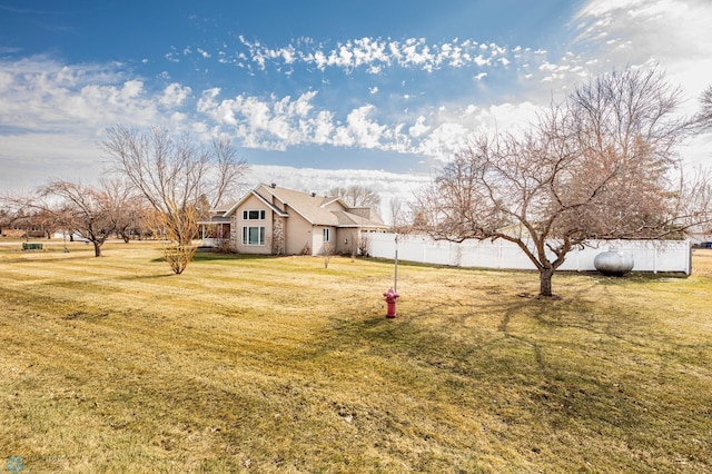 view of yard with fence