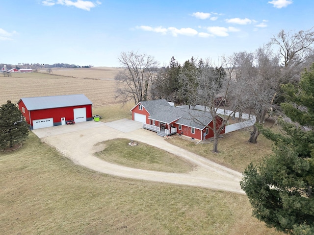 birds eye view of property featuring a rural view