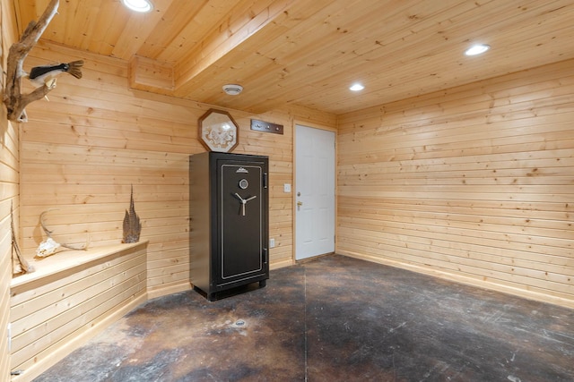 interior space with wooden ceiling, wood walls, and recessed lighting