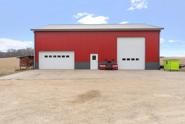 garage featuring driveway
