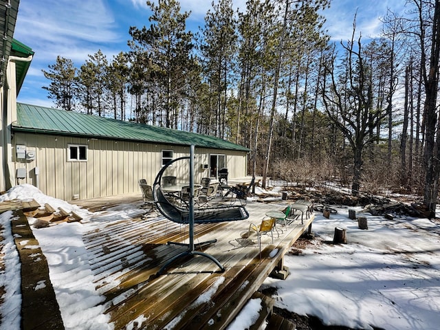 exterior space featuring a wooden deck
