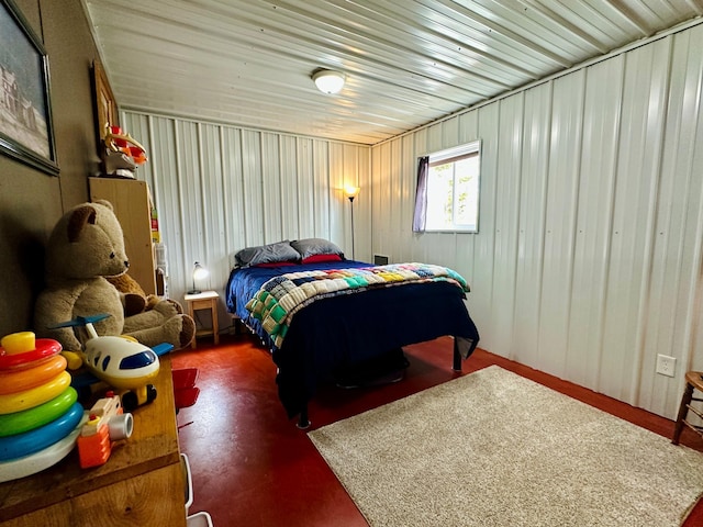 bedroom with finished concrete floors