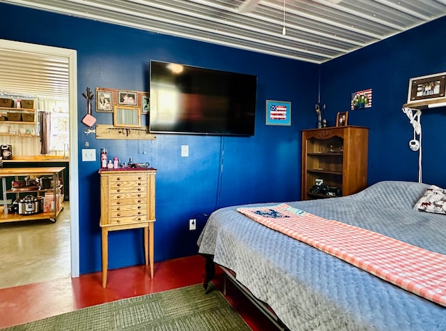 bedroom with concrete flooring