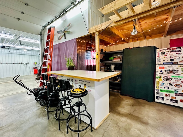 kitchen featuring concrete flooring