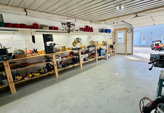 garage featuring a workshop area