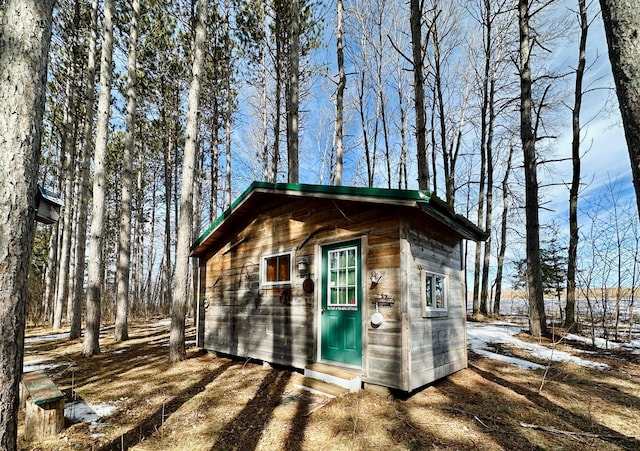 view of outbuilding with an outbuilding