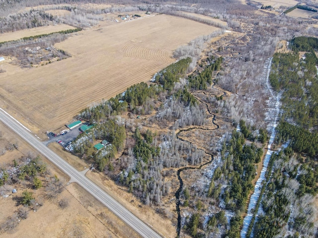 birds eye view of property featuring a rural view