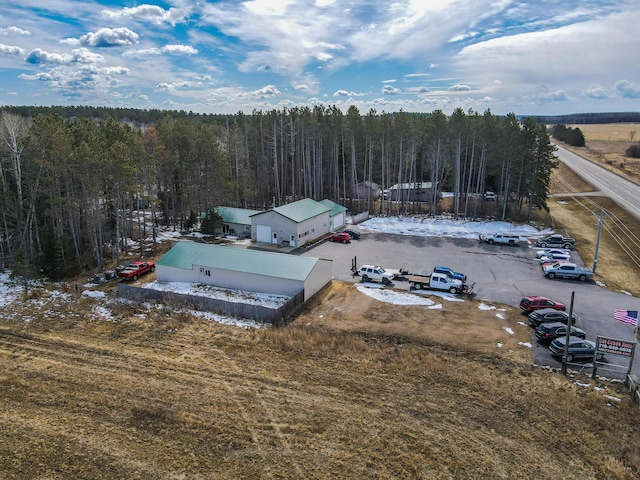 aerial view with a wooded view