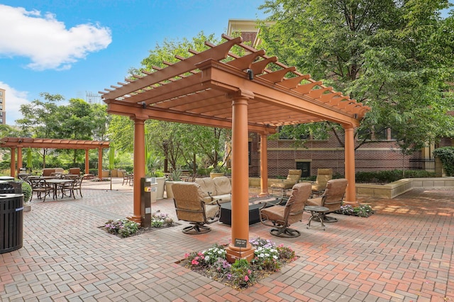 view of patio with a pergola and an outdoor living space