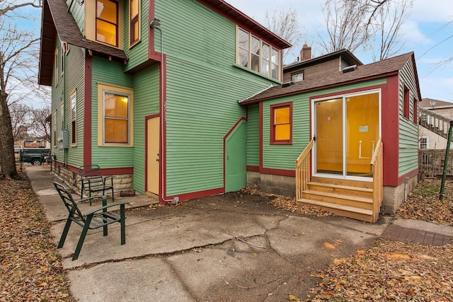 back of house featuring a patio area