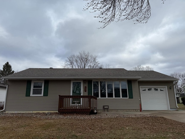 single story home featuring a garage