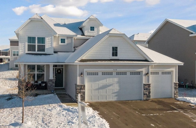 craftsman inspired home with a garage