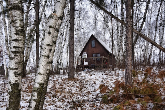 view of snow covered property