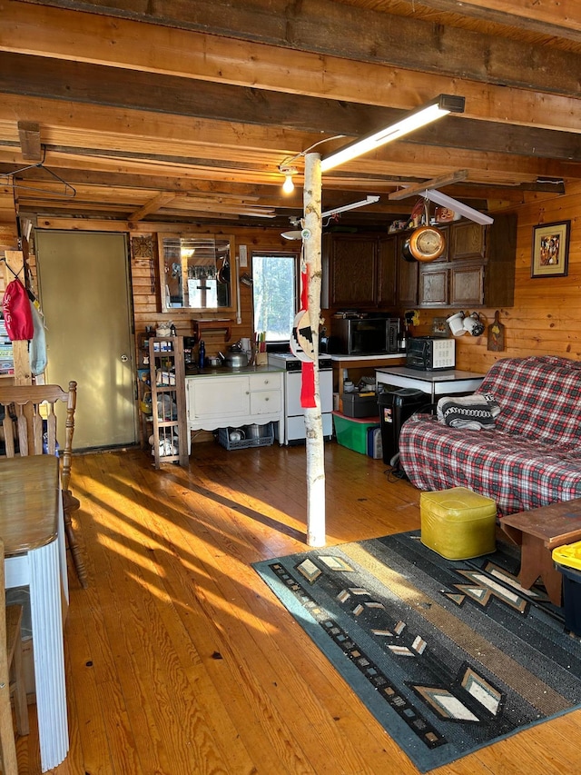 22510 Spider Is, Mantrap Twp, MN 56467 - living area featuring hardwood / wood-style flooring, wood walls, and beam ceiling