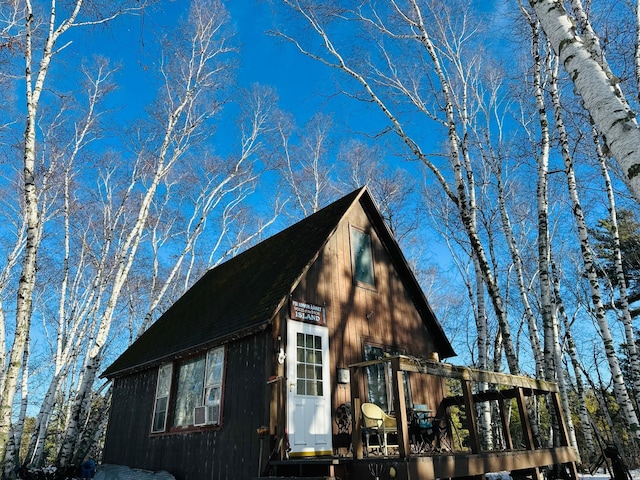 view of side of property with cooling unit