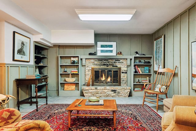 tiled living room with a fireplace