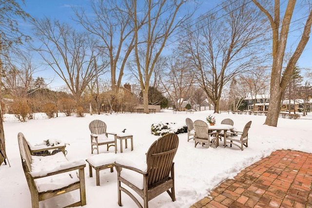 view of snow covered patio