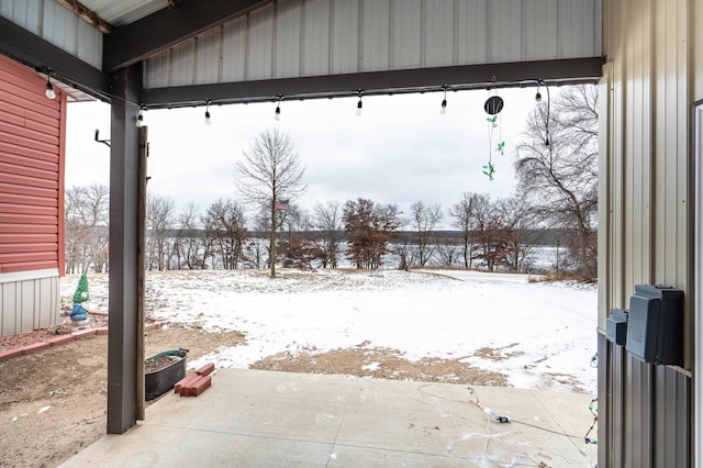 view of yard layered in snow