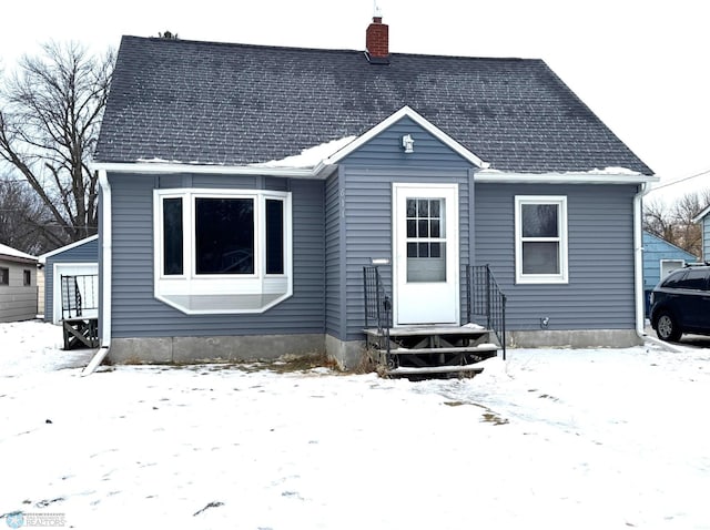 view of snow covered property