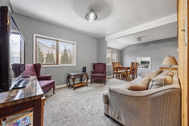 living room with carpet flooring and vaulted ceiling