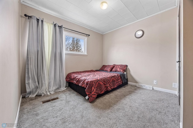 bedroom with carpet and ornamental molding