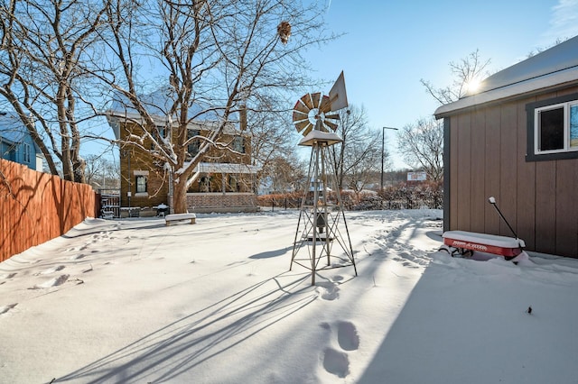 view of yard covered in snow