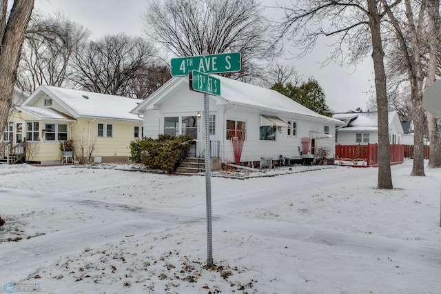 view of snow covered house