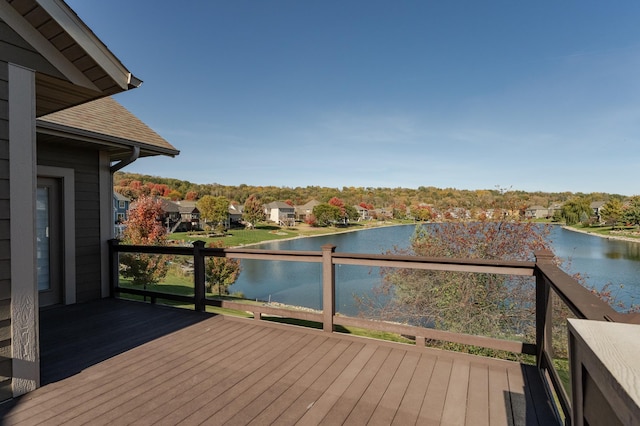 wooden terrace with a water view