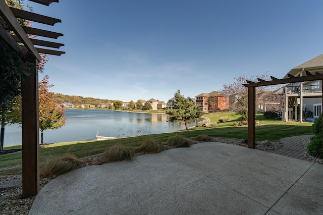 view of patio / terrace with a water view