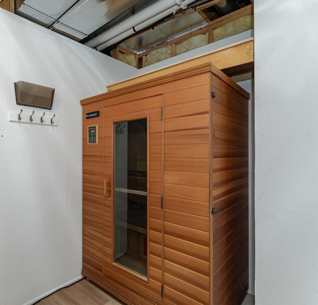 view of sauna / steam room with hardwood / wood-style flooring