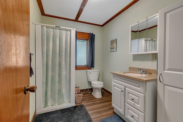 full bathroom with a shower with curtain, toilet, wood finished floors, crown molding, and vanity