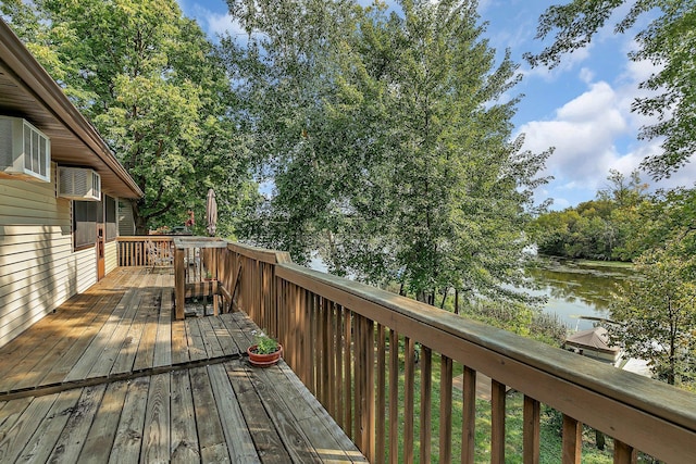 wooden deck with a water view