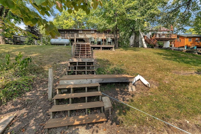 view of yard featuring stairway and a deck