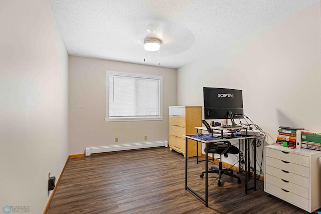 home office with a textured ceiling, ceiling fan, baseboard heating, and dark wood-type flooring