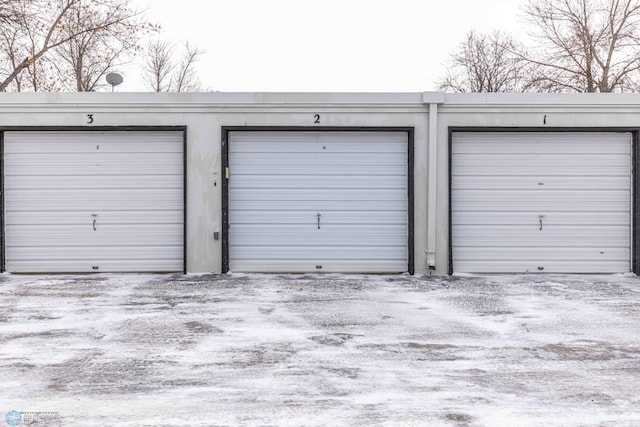 view of snow covered garage