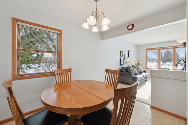 dining area with a chandelier