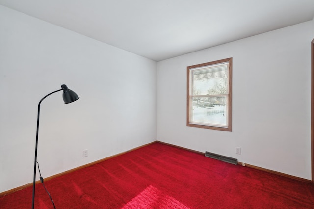 empty room with carpet floors