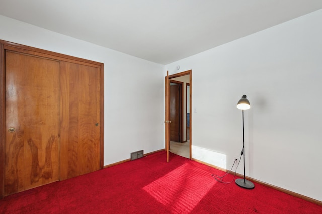 unfurnished bedroom featuring carpet floors