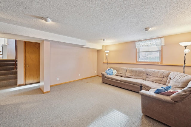 living room with carpet floors and a textured ceiling