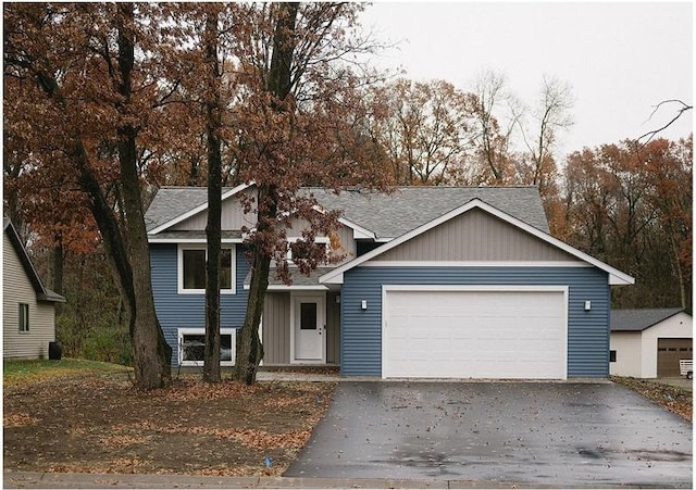 view of front of property with a garage