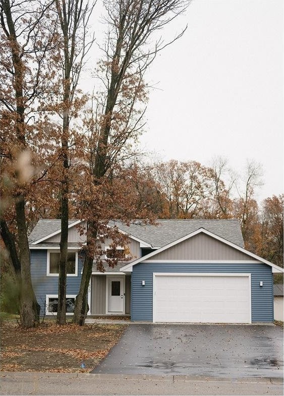 view of front of home with a garage